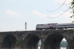 AMTK 145 leads the eastbound Pennsylvanian onto Rockville bridge